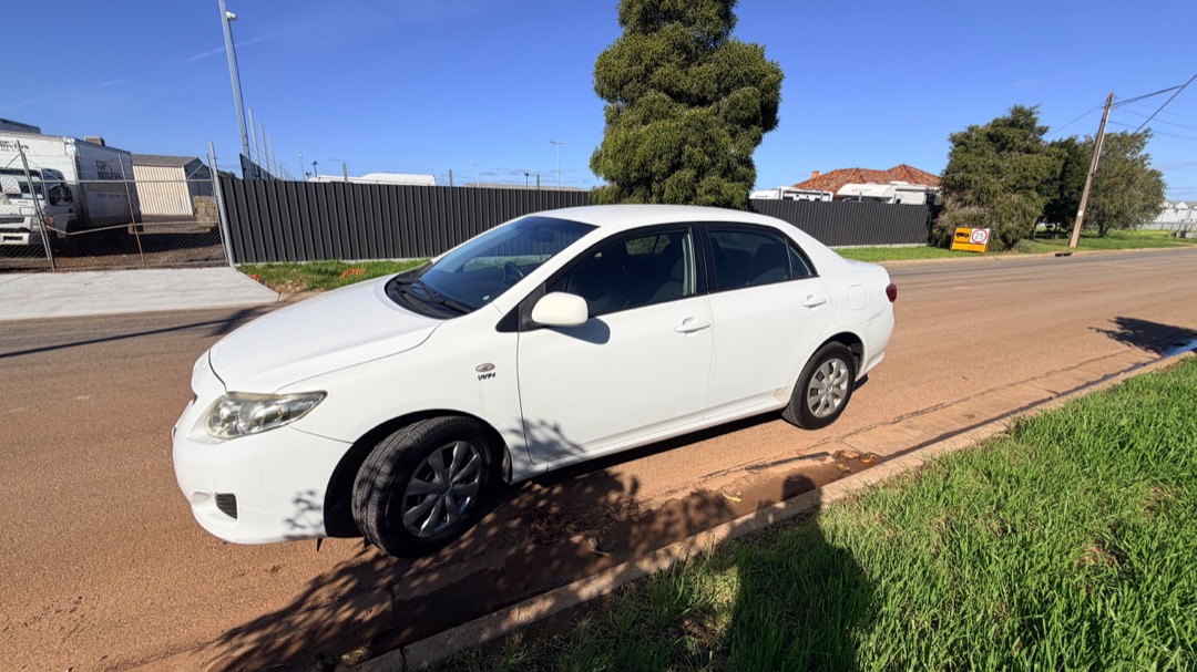 2008 Toyota Corolla Ascent — driver side profile