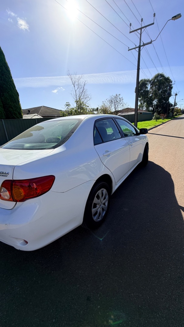 2008 Toyota Corolla Ascent — rear, driver side