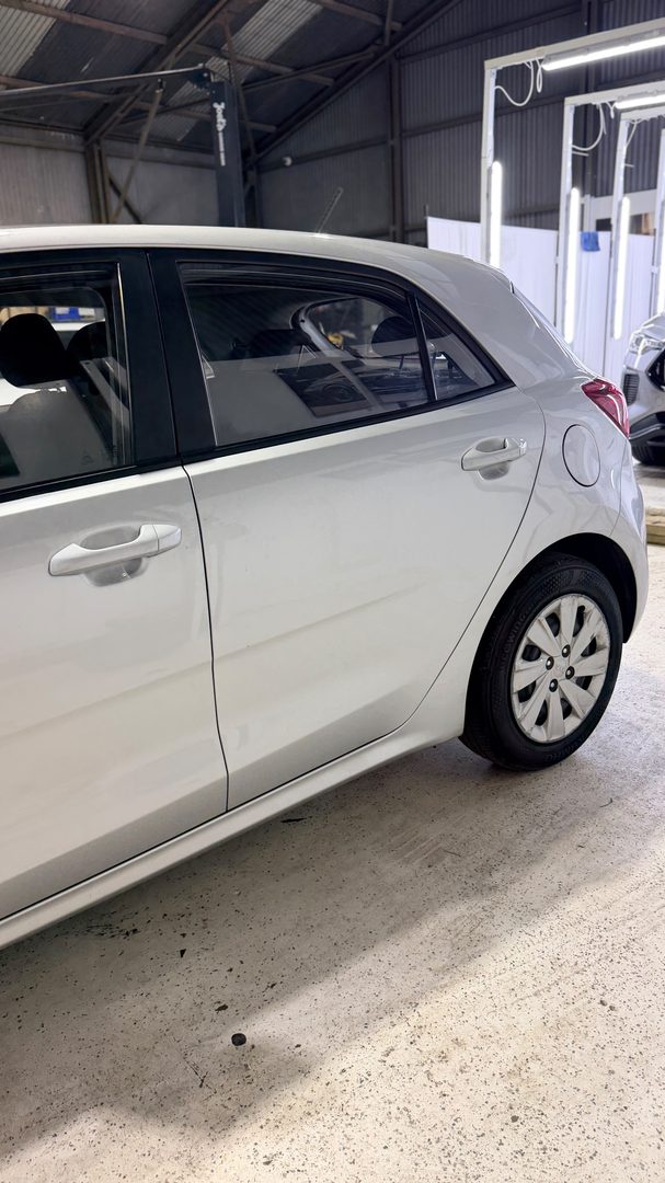2018 Kia Rio — passenger side, rear door and wheel